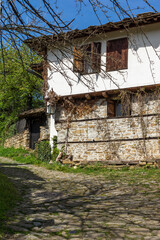 Fototapeta na wymiar Typical street and old houses at village of Bozhentsi, Bulgaria