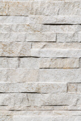 White wall texture with reliefs. Closeup. White background