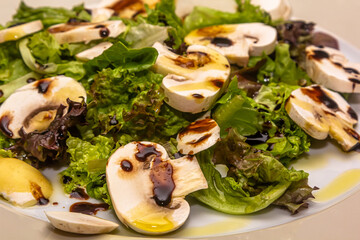 Salad with mushrooms shiitake, champignons, white , beef, arugula, cherry tomatoes and balsamic...