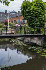 Fototapeta na wymiar Picturesque embankment of the Canal in the Dutch City of Amersfoort. Amersfoort is a beautiful city in the Utrecht province of the Netherlands.