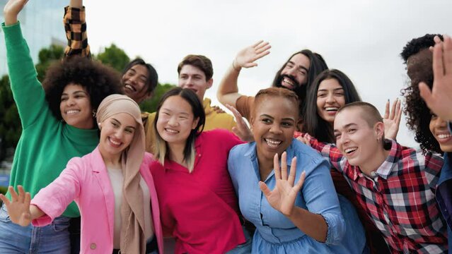 Multiethnic diverse people celebrating together outdoor - Diversity international community