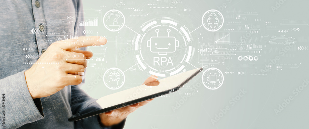 Aufkleber robotic process automation rpa theme with young man holding a tablet computer