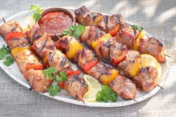 Grilled pork kebab with red and yellow pepper