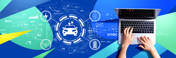 EV concept with person using a laptop computer