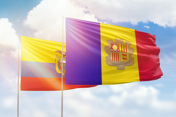 Sunny blue sky and flags of algeria and ecuador