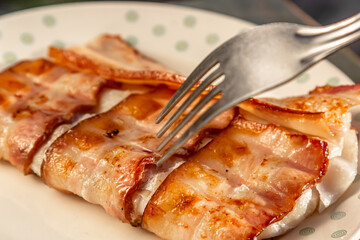 Cod fish wrapped in bacon
