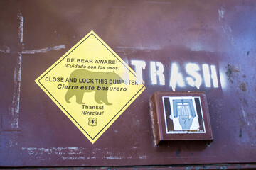 Bear Warning on a Trash Dumpster at a Picnic Area along the Hiking Trail to Switzer Falls in the Angeles National Forest behind Los Angeles, California, USA
