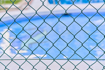 Fototapeta premium swimming pool safety fence for kids in summer 