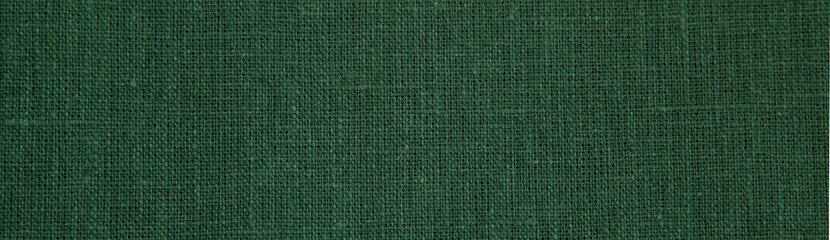 Textured background from natural linen fabric, natural color.