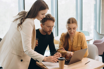 Colleagues discussing strategy during meeting
