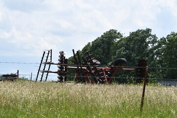 Fototapeta na wymiar Farm Equipment in a Field
