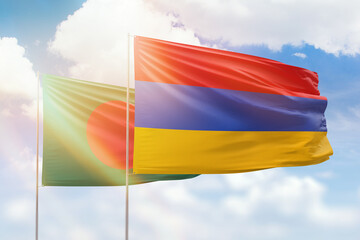 Sunny blue sky and flags of armenia and bangladesh