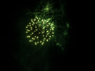 Fireworks display in the port town. low light