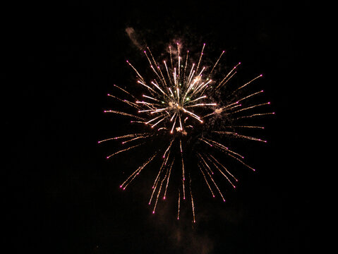 Fireworks display in the port town. low light