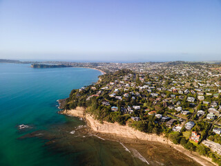 Aerial shots of beachfront property in Red Beach, New Zealand