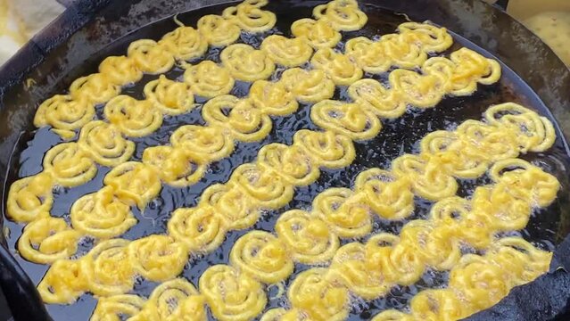 Rows Of Jalebi Being Fried In Large Pan At Chawk Bazar In Dhaka