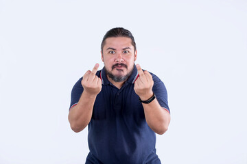 An upset man gives the double middle finger. Showing contempt and anger, saying fuck you. Isolated...