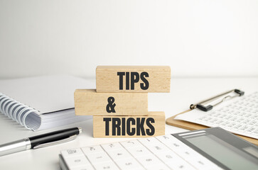 tips and tricks word abstract in wooden cubes