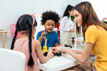 Asian beautiful young woman teacher teach lesson to student at school.