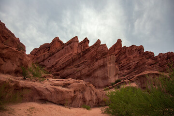 High sharp red rocks at sunset, Cafayate, Salta Province, Argentina