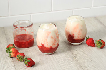 Korean Strawberry Milk with Homemade Strawberry Compote Sauce on White Background