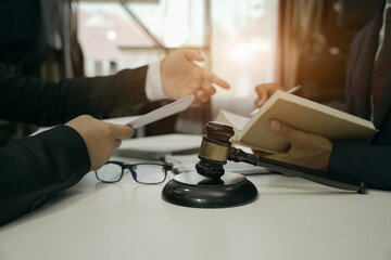 Judge gavel with Justice lawyers having team Concepts of Law and Legal services