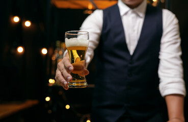 Barman pouring whiskey whiskey glass beautiful night