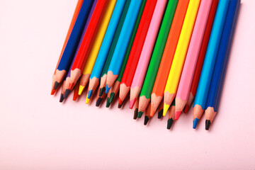 Fototapeta premium close up photo of a collection of colourful wooden pencil, art supplies. isolated on studio background with copy space.