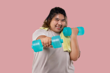 Asian large girl doing fitness exercises with dumbbells isolated.