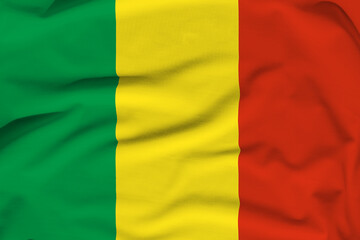 Mali national flag, folds and hard shadows on the canvas