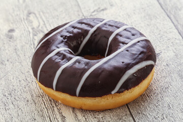 Glazed sweet tasty chocolate donut