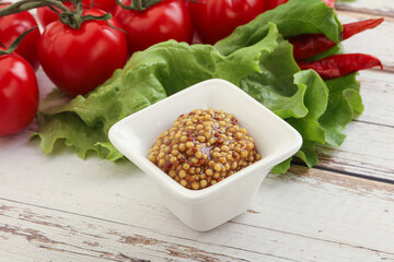 Mustard seeds sauce in the bowl
