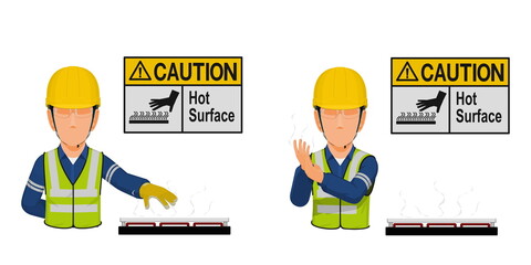 A worker with hot surface warning sign