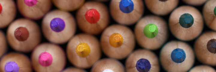Big assortment of colourful pencils tips placed tailgating