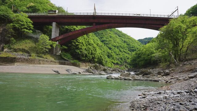 Metal Bridge Over Katsura River in Kyoto, Japan, Hozukyo Station