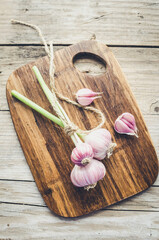 Rustic style garlic on vintage wooden background