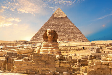 View on the Great Sphinx and the Ruins of Egypt Necropolis in Giza - obrazy, fototapety, plakaty