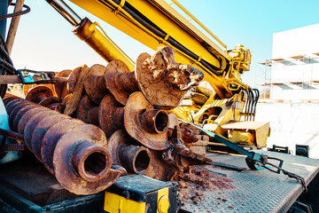 Drilling equipment for drilling wells. Fragment of a machine with large augers for geological and...