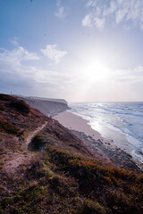 Picturesque pathway on rock ocean shore, Portugal.