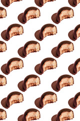 the bitten-off chocolate candy on background