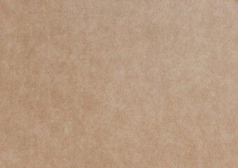 Vintage brown paper texture, horizontal top view. Craft paper background close up.