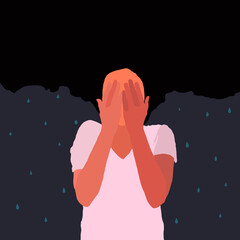 A crying girl covers her face with her hands