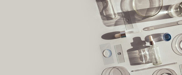 serum in petri dishes on light background cosmetic research concept with place for text
