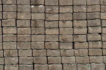 Side of the bricks laid an orderly pavement on the garden or walkway. for construction background.