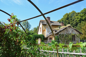 Title: The Marlborough Tower and pond in the Queen s Hamlet at Marie-Antoinette s Estate near...