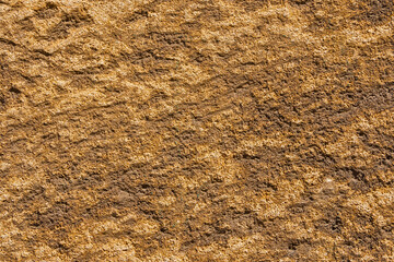 Brownish stone with rough surface as background
