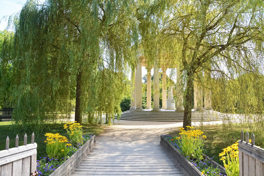 Title: The Marlborough Tower and pond in the Queen s Hamlet at Marie-Antoinette s Estate near Versailles Palace.