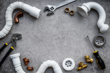 Plumbing work background frame. Plumbing pipes and tools