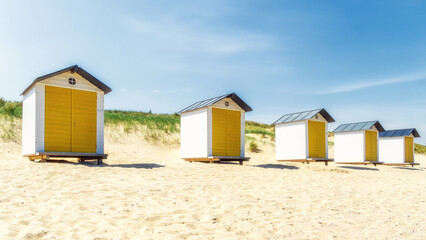 Fototapeta na wymiar Lonely colorful beach lockers on a Dutch beach