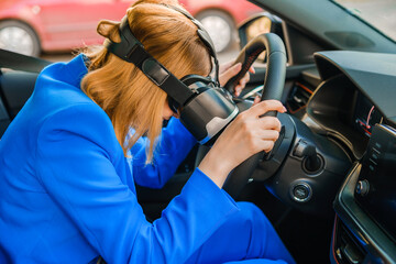 Business woman in the VR googles sitting in the car and put her head on the steering wheel. Game...
